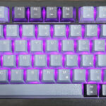 Close-up view of the Corsair K65 Plus Wireless keyboard keycaps with dye-sublimated PBT keys.