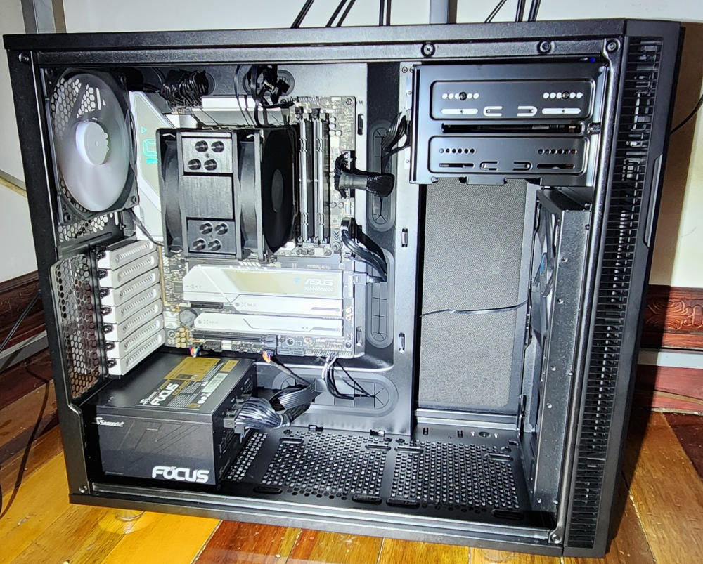 Interior view of the Fractal Design Define R5 case highlighting the cable routing and wire management features.