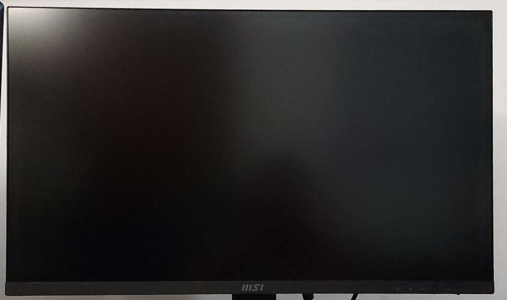 Close-up of the MSI PRO MP273U 4K UHD monitor screen with matte finish.